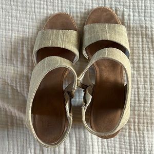 Tom’s gold dress sandals. Worn little.